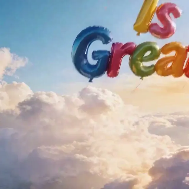 Colorful balloon letters floating upward and spelling out a word