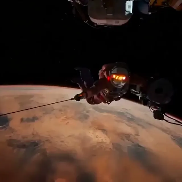 Still frame holding mid-action, then footage rewinding backward in a cinematic freeze-frame